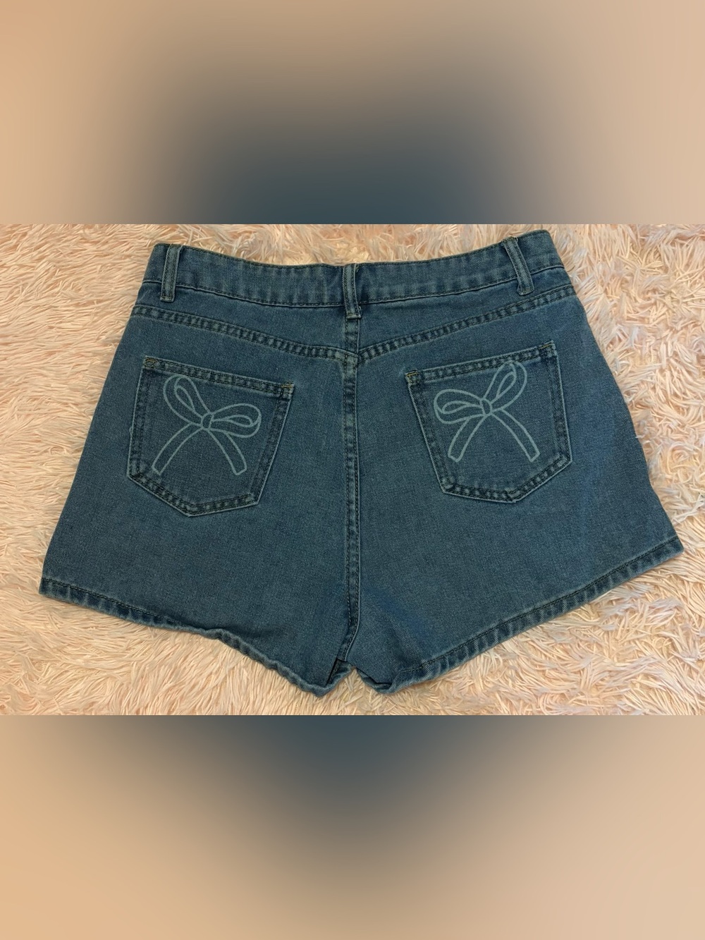High-Rise Blue Denim Shorts with Back Pocket Bow Detail